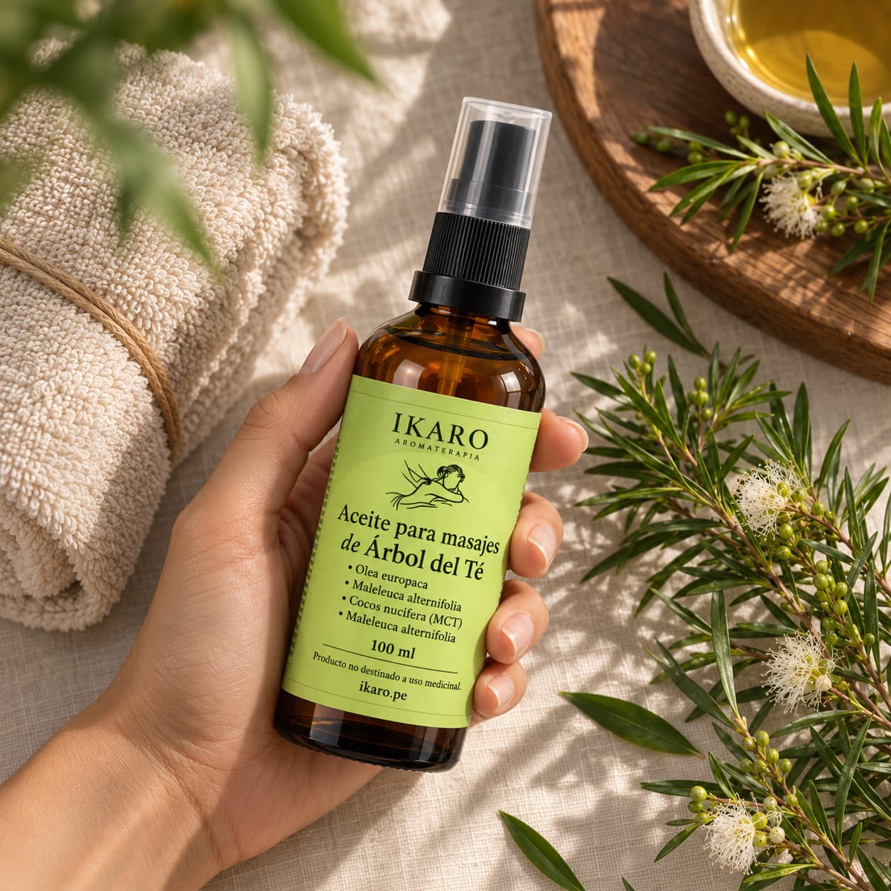 Aceite de masaje de árbol del té IKARO elaborado con jojoba, oliva, coco fraccionado y aceite esencial puro de Melaleuca alternifolia